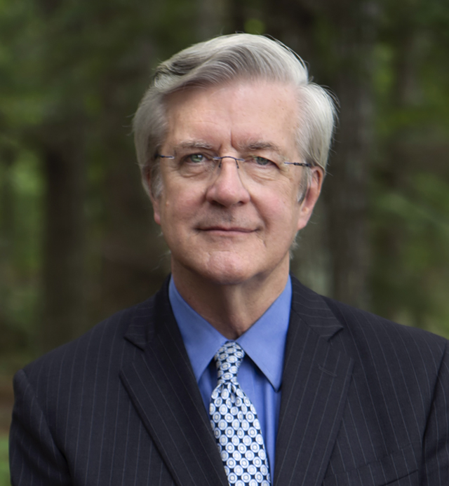 James W. Hughes